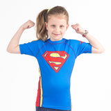 Superman logo kids rashguard short sleeve front flexing